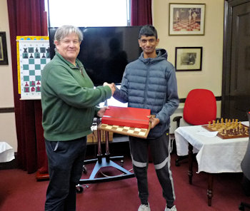 Raghuram receiving a prize at a junior event earlier this year